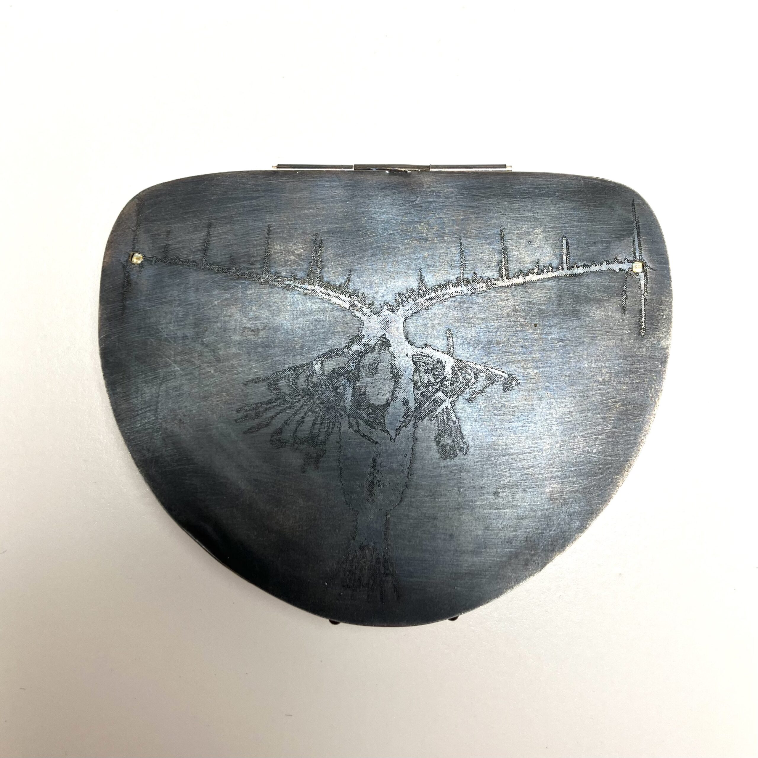 Underverk – brosch med lysräka