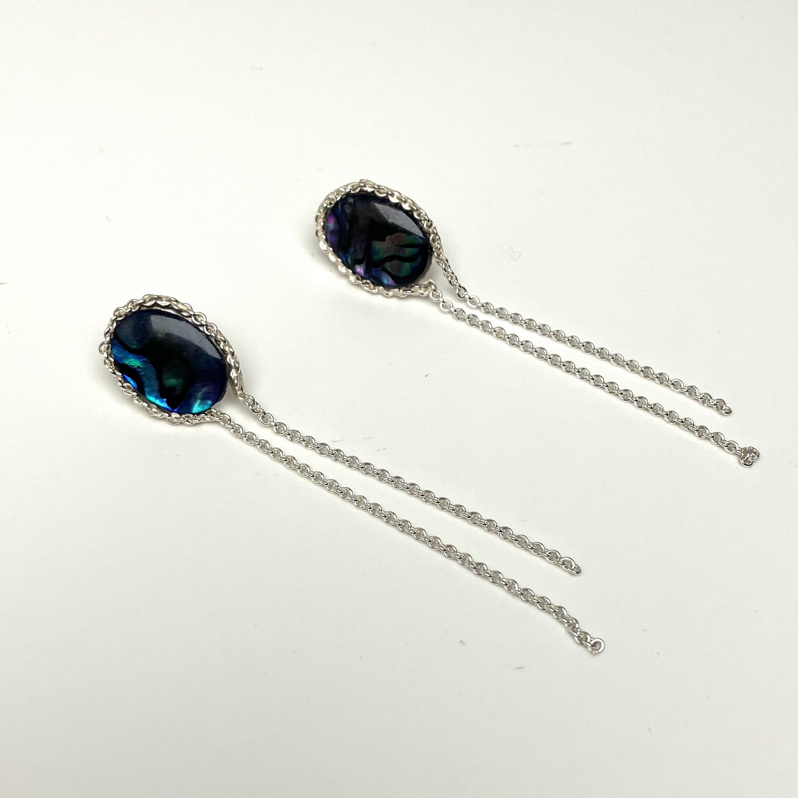 Örhängen med paua-snäcka